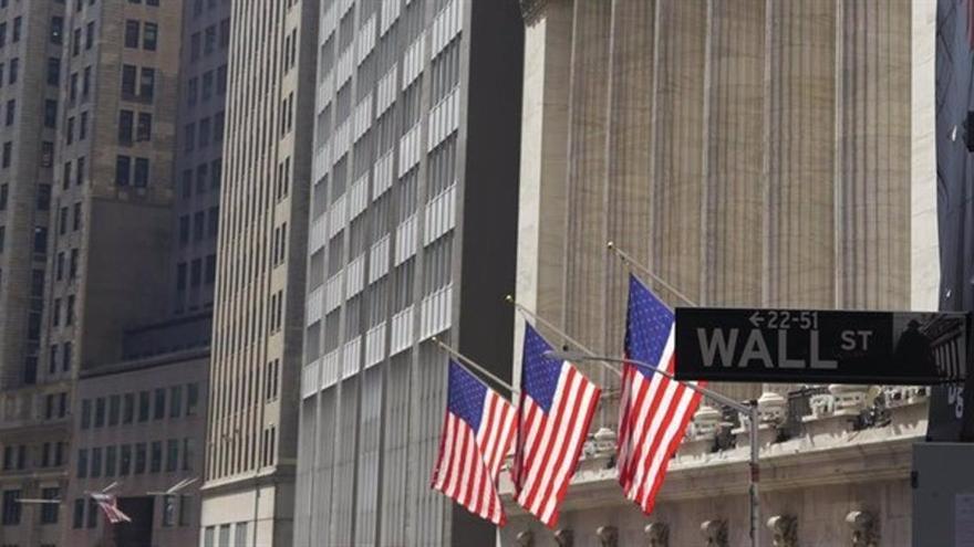 Wall Street acoge con alzas la decisión de la Fed de recortar los tipos en 0,25 puntos