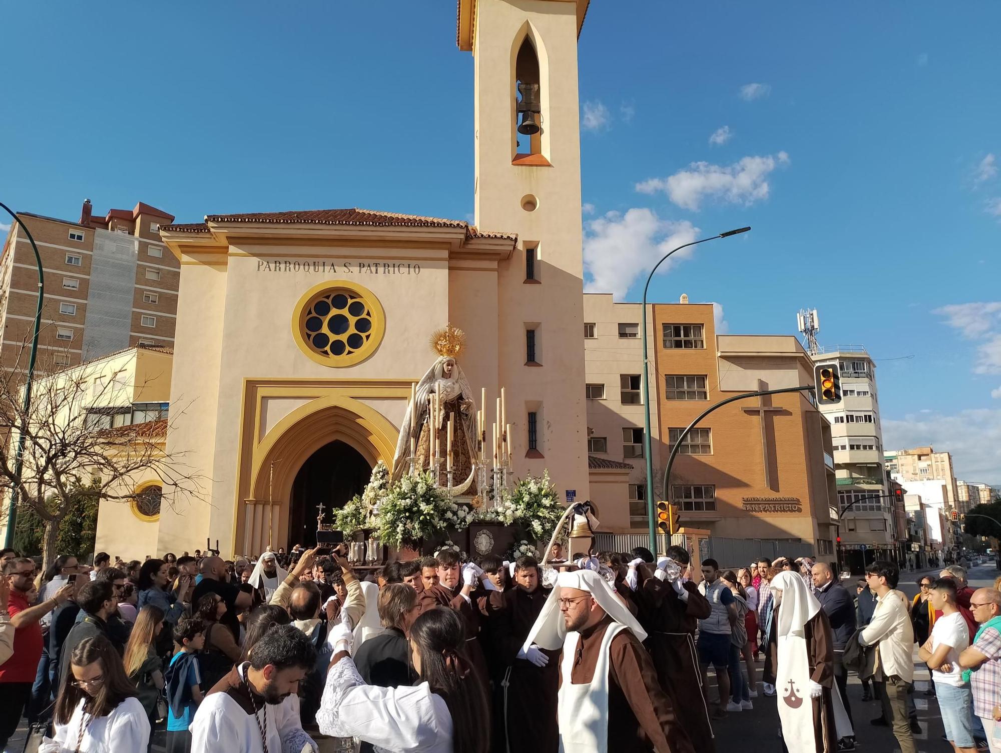 La procesión de la Virgen de Lágrimas del Carmen de Huelin, en imágenes