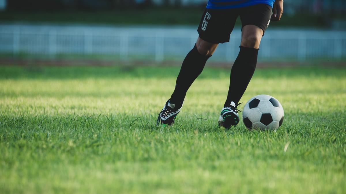 Soccer player action on the stadium