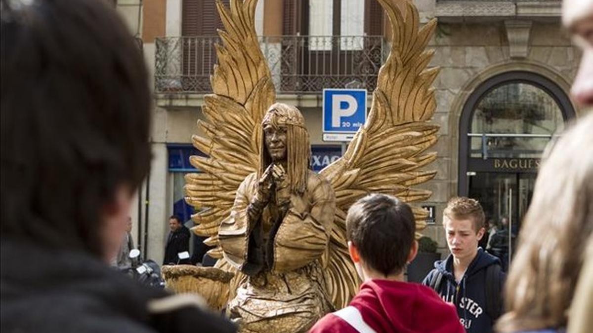 Estatua humana en la Rambla.