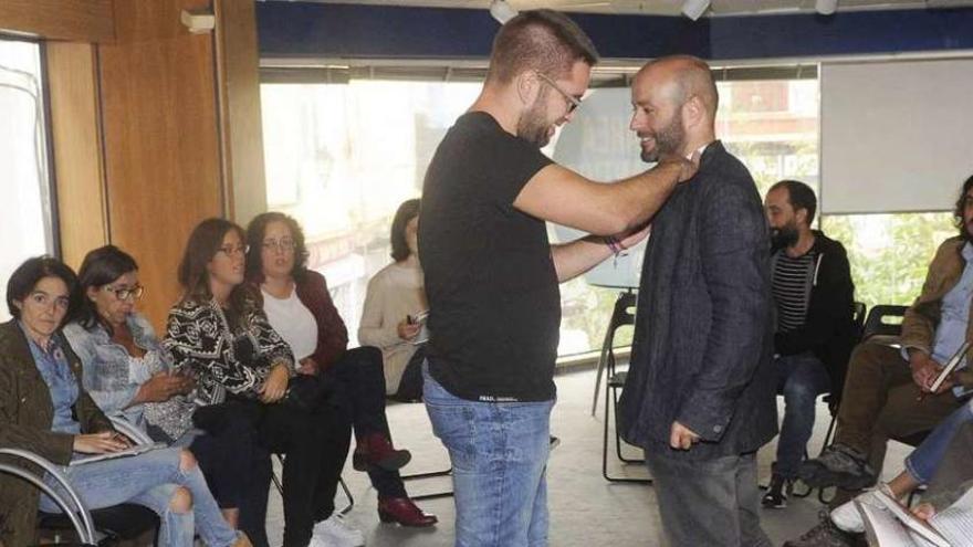 Un momento del encuentro entre los representantes de la plantilla y En Marea.