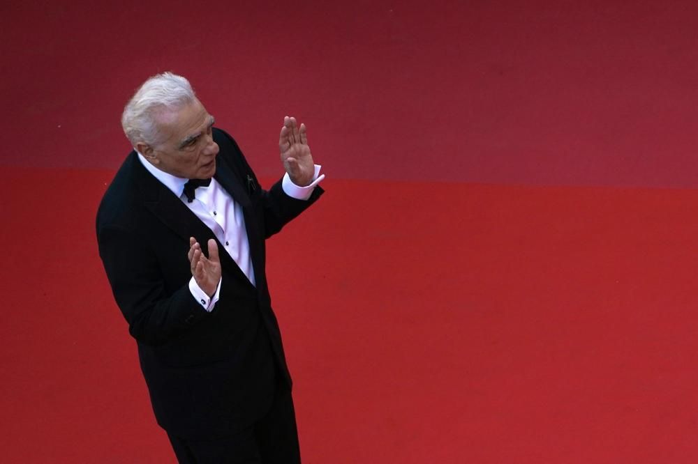 US director Martin Scorsese poses as he arrives on May 8, 2018 for the screening of the film "Todos Lo Saben (Everybody Knows)" and the opening ceremony of the 71st edition of the Cannes Film Festival in Cannes, southern France.  / AFP PHOTO / Laurent EMMANUEL