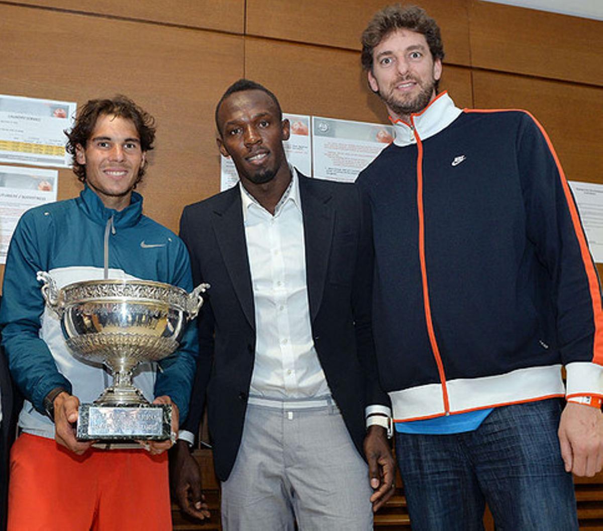 Rafa Nadal, acompanyat d’Usain Bolt i Pau Gasol, al guanyar el seu vuitè Roland Garros.