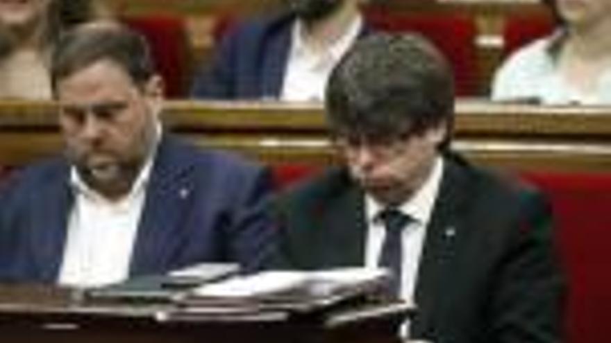 Oriol Junqueras i Carles Puigdemont ahir al Parlament.