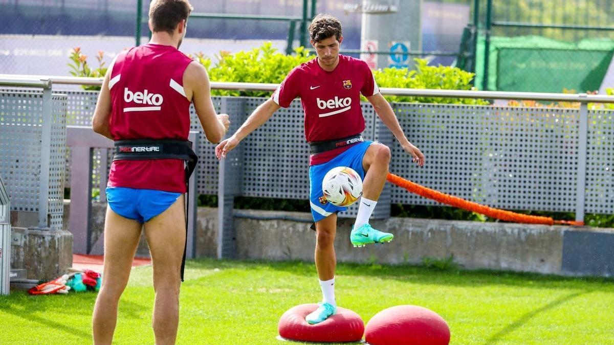 Sergi Roberto y Piqué, en un ejercicio.