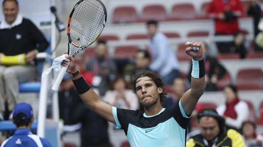 Nadal festeja su victoria ante el estadounidense Sock. // How Hwee Young