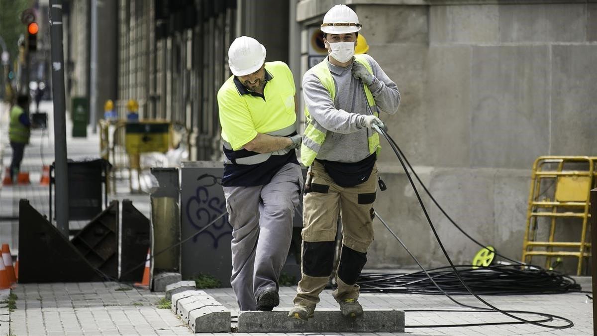 Trabajadores de la construcción y la obra pública, en Barcelona.