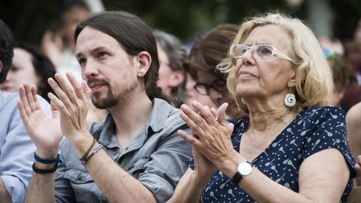 Pablo Iglesias y Manuela Carmena, este miércoles, 13 de mayo, en un mitin en Madrid.