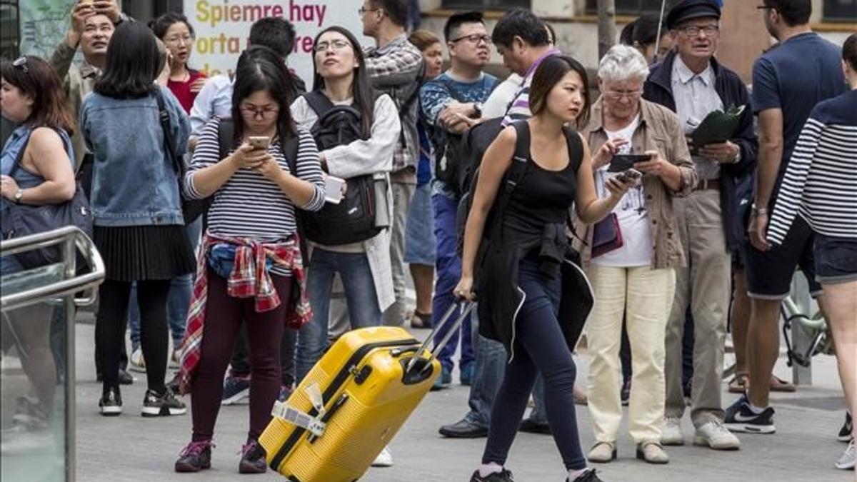 Turistas por la Sagrada Familia