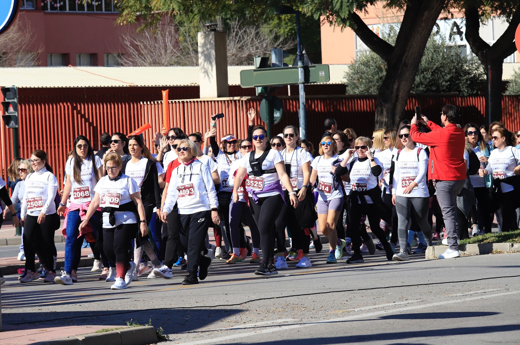 La salida y el recorrido de la Carrera de la Mujer 'inmortalizados' en imágenes