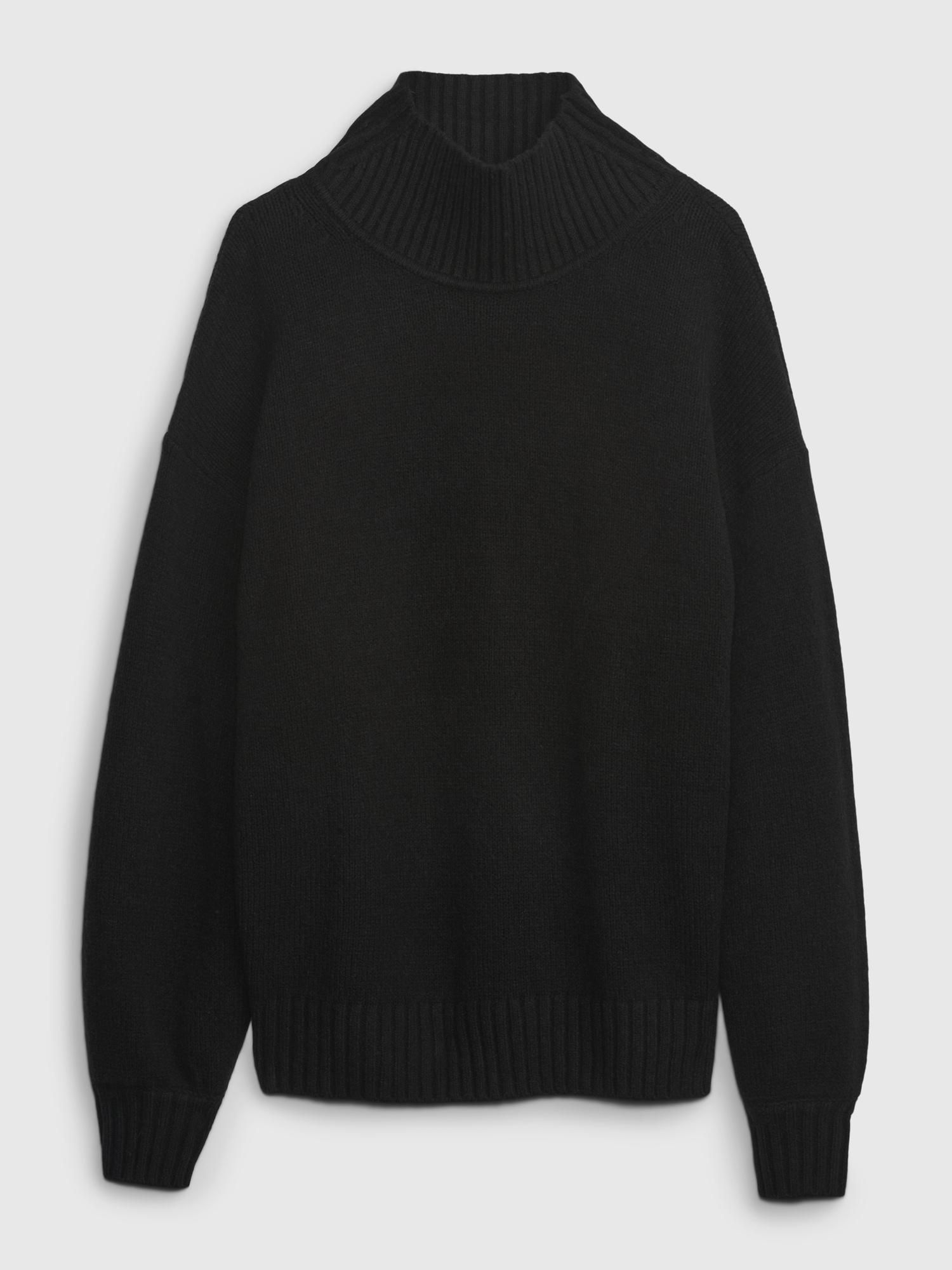 Jersey negro cuello alto GAP, 48€