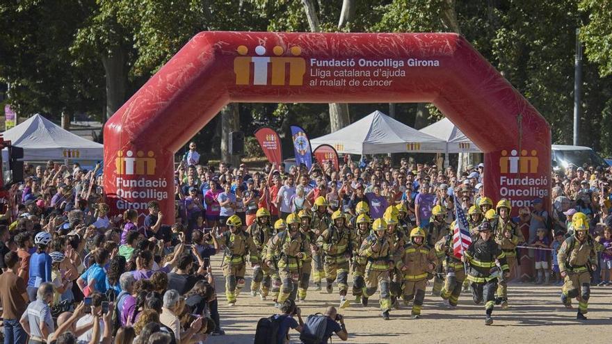 Més de 1.000 persones participen en la quarta edició de la cursa solidària "Apaguem el càncer" a Girona