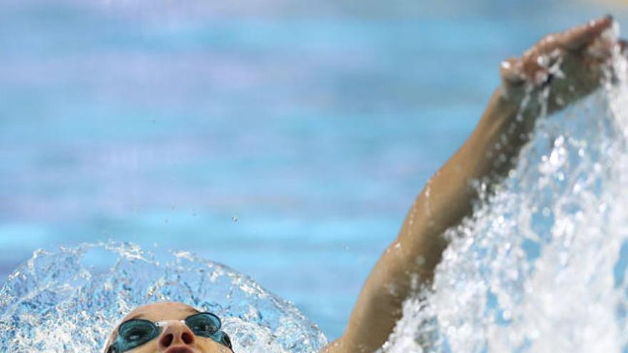 La nadadora malagueña (7-1-1998), en pleno esfuerzo en los 200 espalda, donde se colgó el bronce en el Mundial de piscina corta.