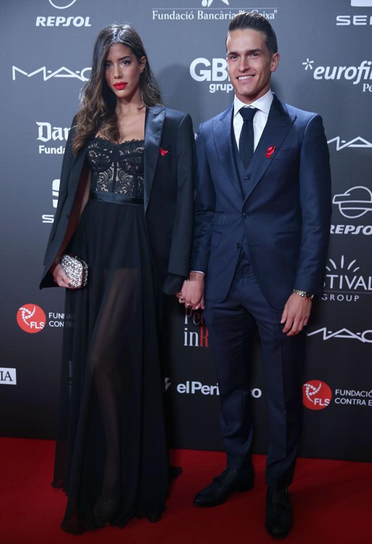 Denis Suarez y Dania Aviles en la gala People in Red en Barcelona