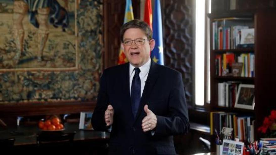 El presidente de la Generalitat, Ximo Puig, durante su mensaje de Fin de Año en el Palau.