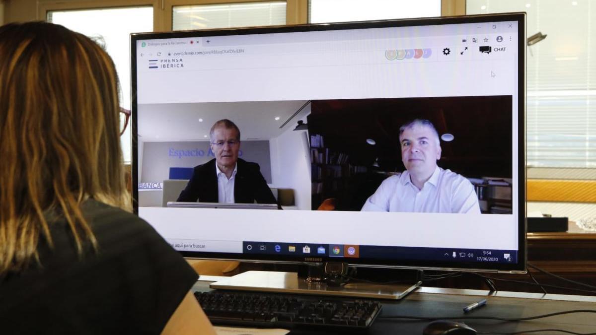 Santiago Lago y Pedro Veiga, durante el debate telemático de esta mañana.