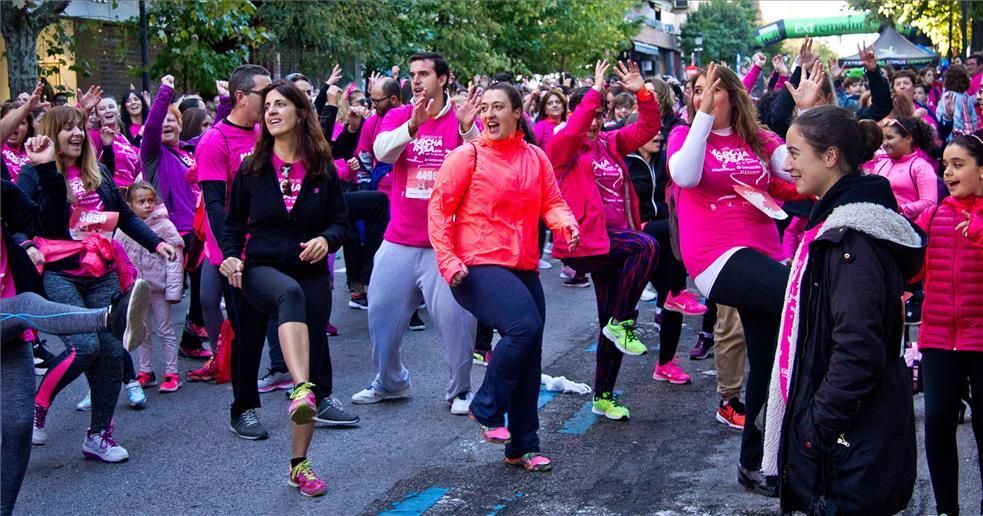 Las imágenes de la marcha y la carrera rosa de Cáceres
