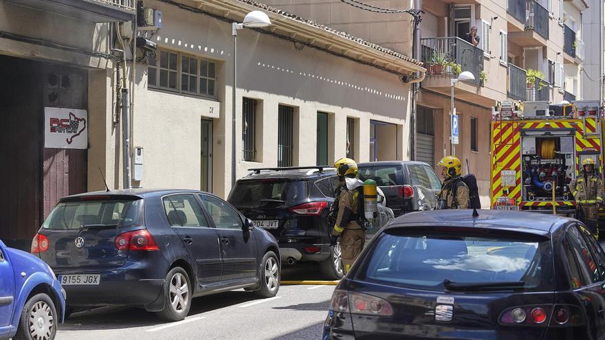 Incendi en un local de Girona
