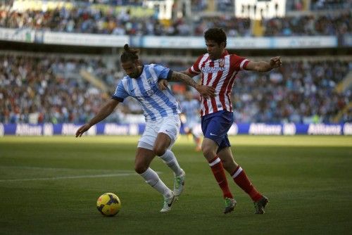 Imágenes del partido disputado entre Málaga y el Atlético de Madrid.
