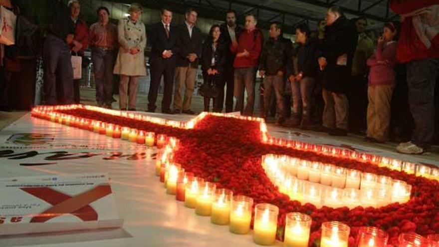 Miembros de El Imán, junto con el alcalde y varios concejales de Vigo, ayer en la Praza do Rey