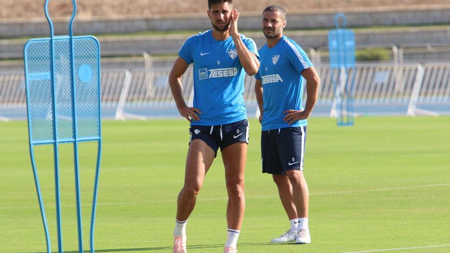 Adrián, junto a Lacen en un entrenamiento.