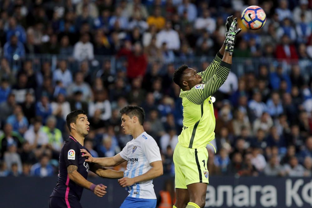 Imágenes del partido entre Málaga y Barcelona.