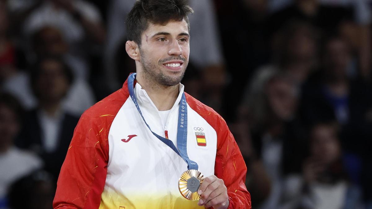 Los reyes y Sánchez celebran el bronce de Garrigós, primera medalla olímpica para España