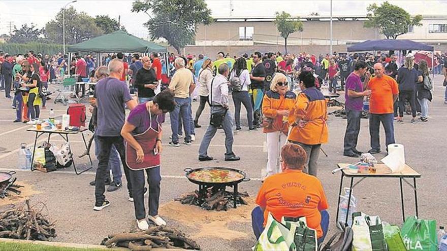 Paellas y honores para la patrona en su jornada grande