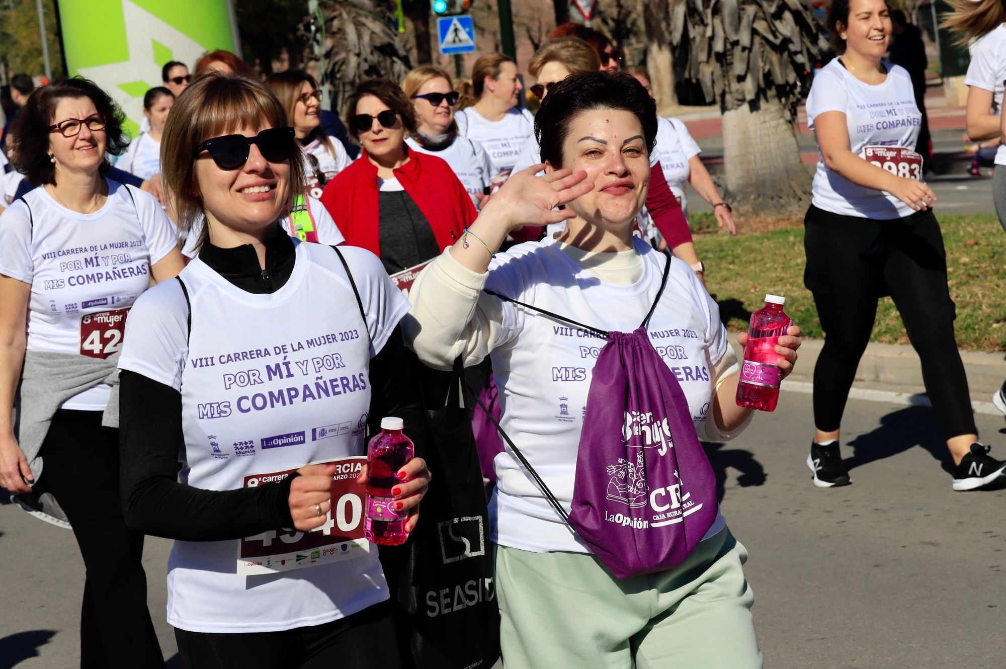 La salida y el recorrido de la Carrera de la Mujer 'inmortalizados' en imágenes