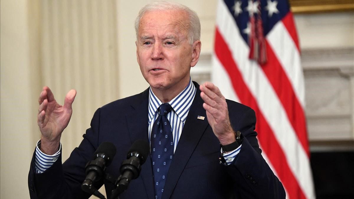 US President Joe Biden speaks on the passage of the American Rescue Plan in the State Dining Room of the White House in Washington  DC  on March 6  2021  - The US Senate approved the  1 9 trillion rescue package that Biden vows will revive the country s pandemic-stricken economy  Passed by 50 votes to 49 in a party line vote  the sweeping legislation now heads back to the Democratic-majority House of Representatives  where it is expected to be adopted barring a last-minute setback  (Photo by SAUL LOEB   AFP)