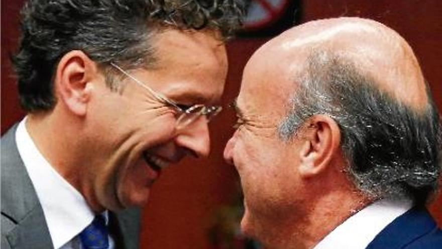 Dijsselbloem i De Guindos ahir en la reunió de l&#039;Eurogrup.