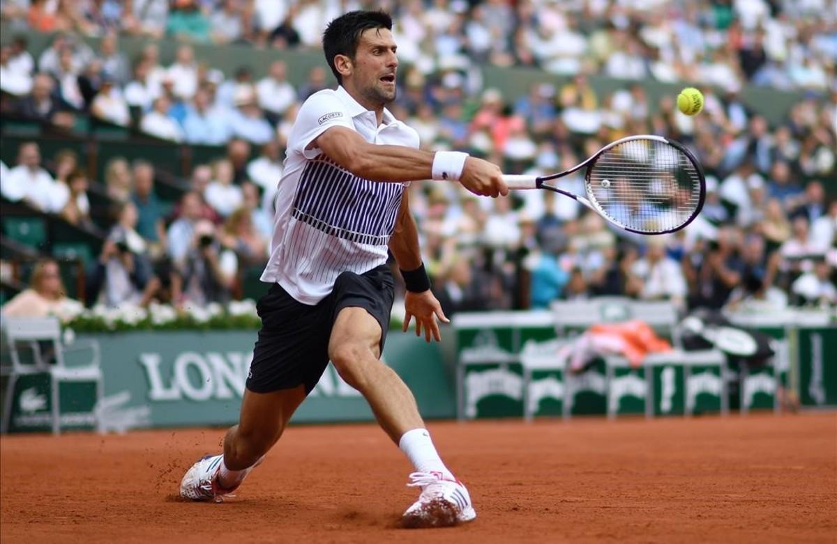 lmendiola38714862 topshot   serbia s novak djokovic returns the ball to argent170603165518