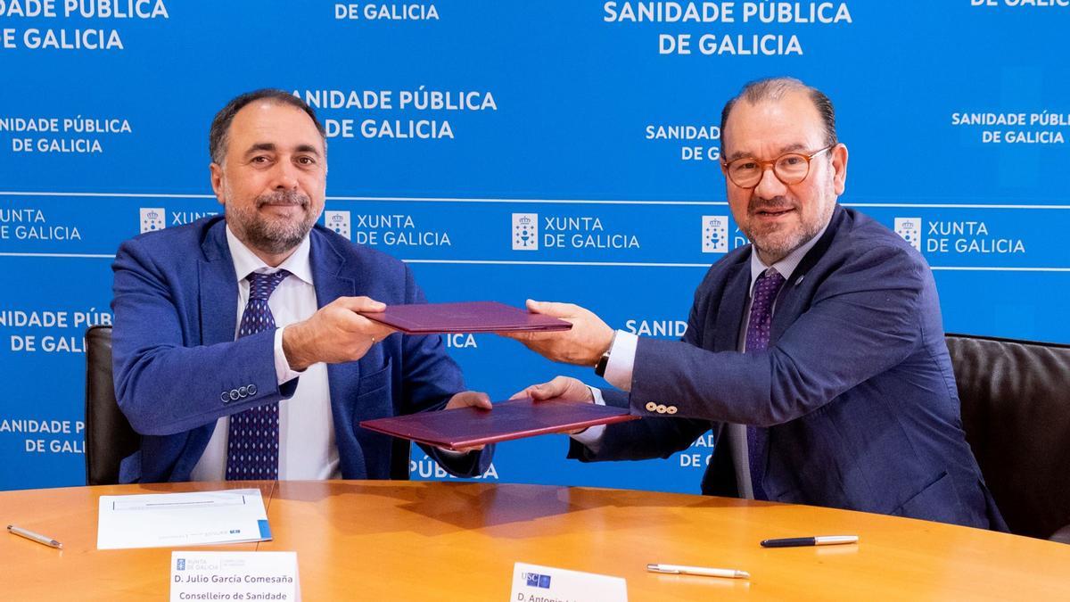 O conselleiro de Sanidad, Julio García Comesaña, co reitor da Universidade de Santiago de Compostela, Antonio López