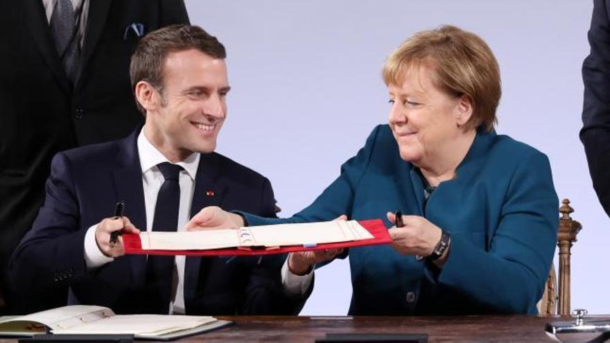 Reunión Merkel-Macron en Davos