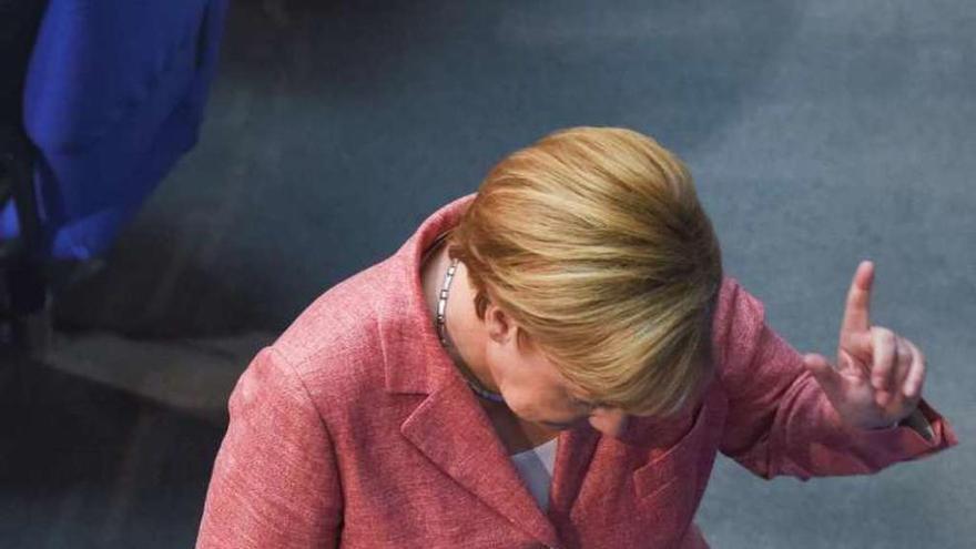 Merkel, ayer, en el Bundestag, cámara baja del Parlamento alemán.