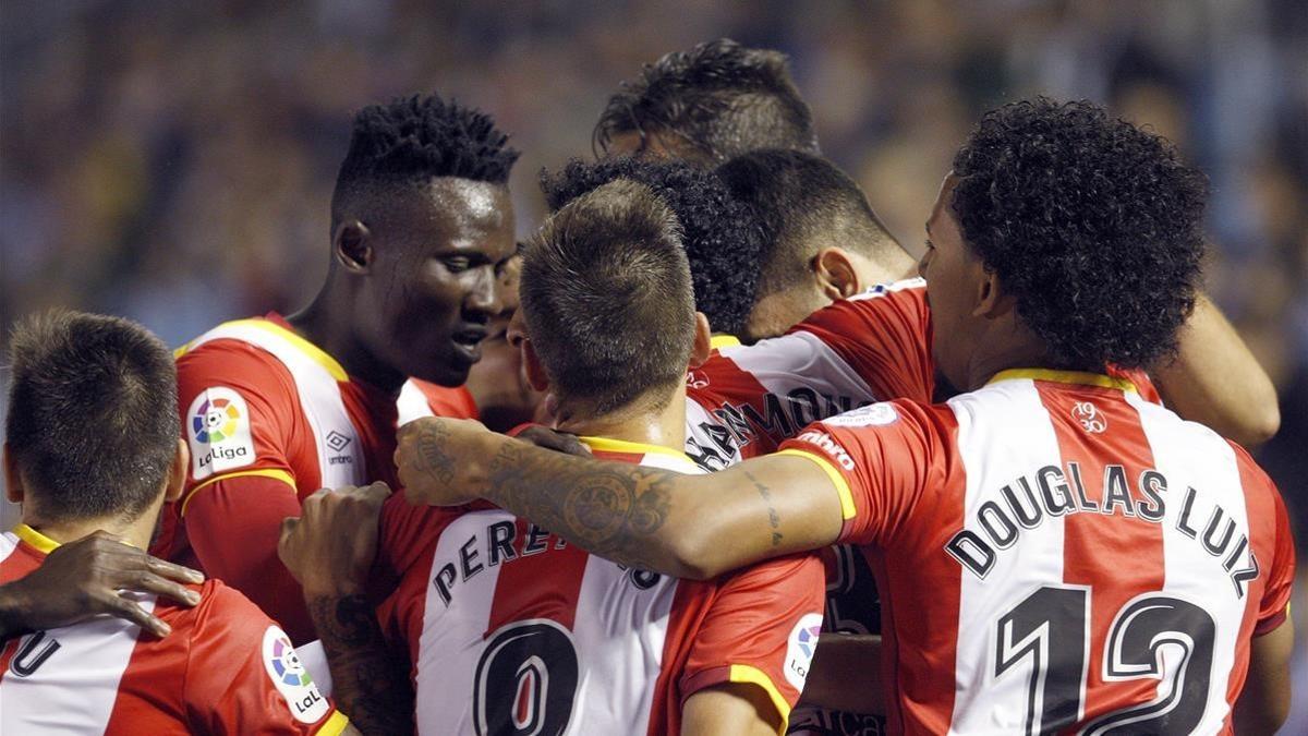 Los jugadores del Girona celebran el gol de Juanpe, que suponía el empate a 3 en Balaídos.