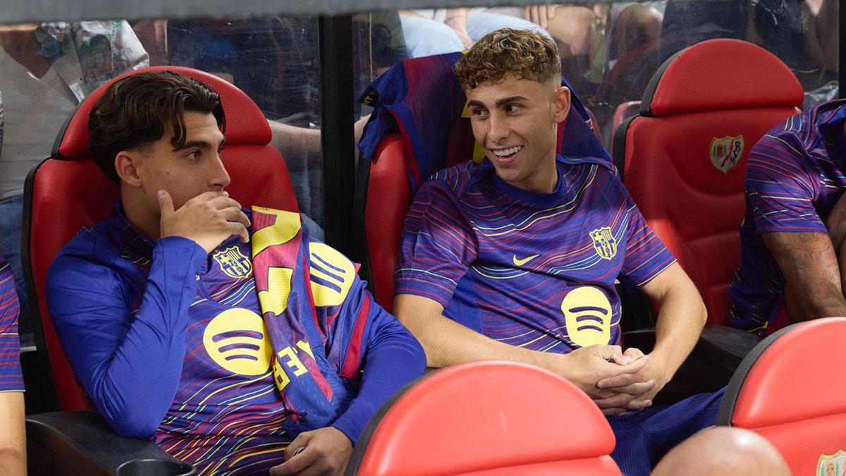 Toni fernández y Fermín en el banquillo de Vallecas