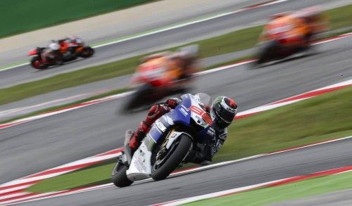 Yamaha MotoGP rider Lorenzo of Spain leads Honda riders Pedrosa and Marquez on his way to win the San Marino Grand Prix in Misano circuit in central Italy