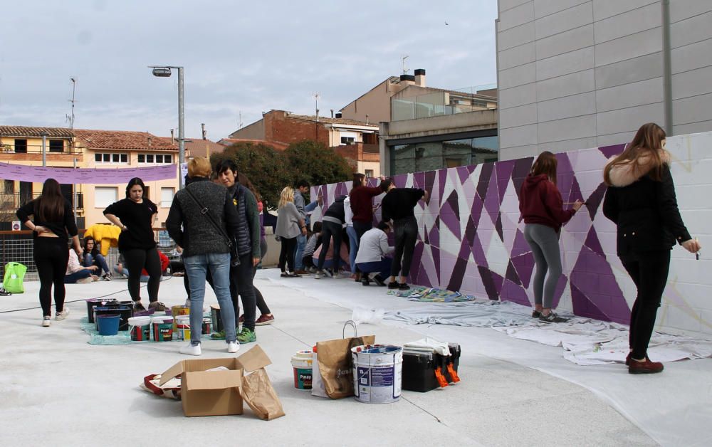 Pintada d'un mural a Sant Fruitós de Bages