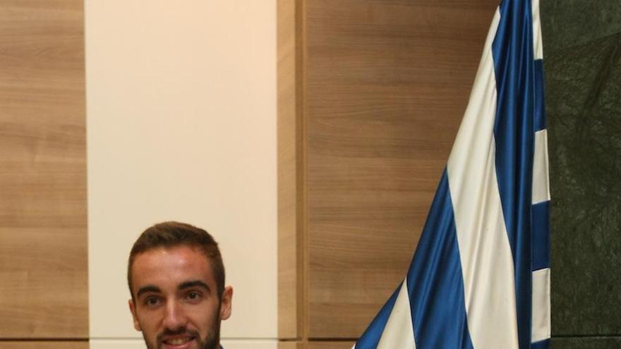 Darder, con la bandera del Málaga.