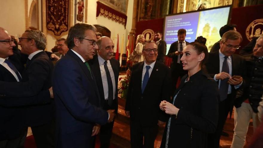 El fiscal Álvaro Redondo. junto a responsables de la UCAM en la inauguración de las jornadas.