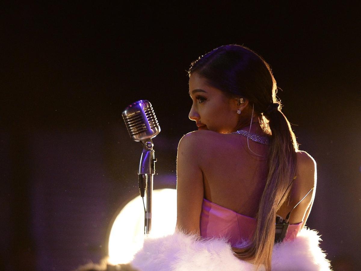 Singer Ariana Grande performs in this pool photo during the 2016 MTV Movie Awards in Los Angeles April 9, 2016 and released April 10, 2016.  REUTERS/Kevork Djansezian/Pool