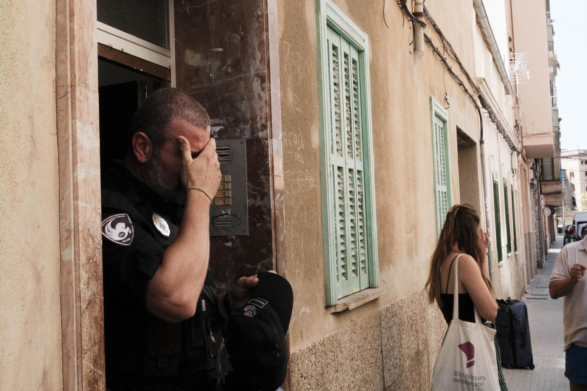 Desahucio de varias familias con niños que vivían en un edificio okupado en Palma