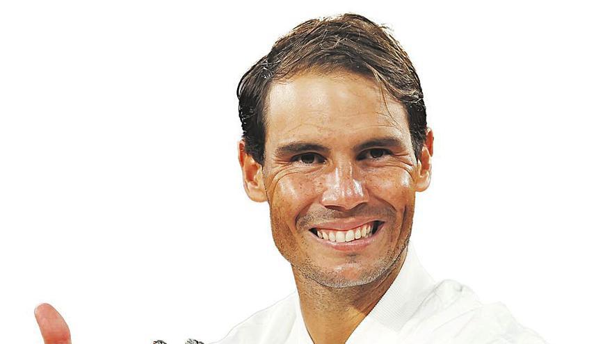 Rafa Nadal  celebra su  decimotercer título en  Roland Garros. | Christian  Hartmann /  Reuters