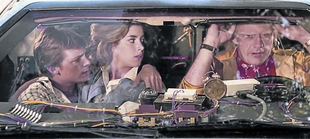 Michael J. Fox, Claudia Wells i Christopher Lloyd, en una escena de ’Retorn al futur’.
