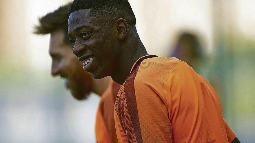 Dembélé y Messi en el entrenamiento de ayer del Barcelona.