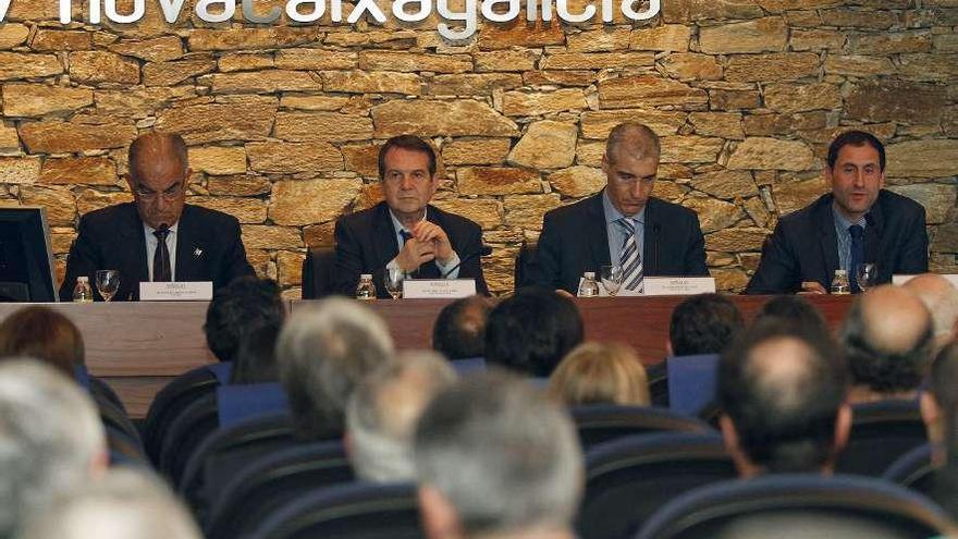 De izda. a dcha., José García Costas, Abel Caballero, Francisco Conde y Javier Arnau, ante medio centenar de empresarios en la presentación de Navalia, que se celebrará en Vigo del 20 al 22 de mayo.  // Jorge Santomé