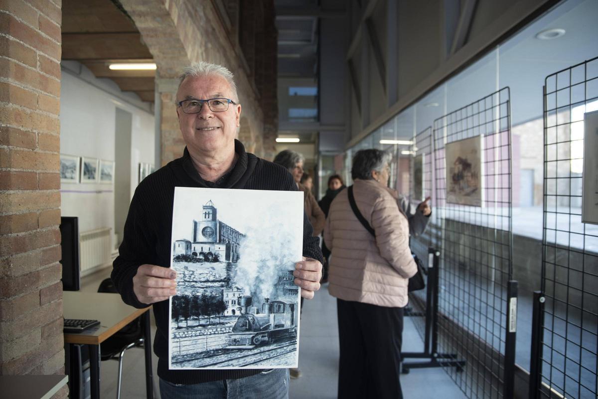 Albert Canal ensenya l’aquarel·la titulada «La Seu i el carrilet», que uneix la basílica de Manresa i el record del tren