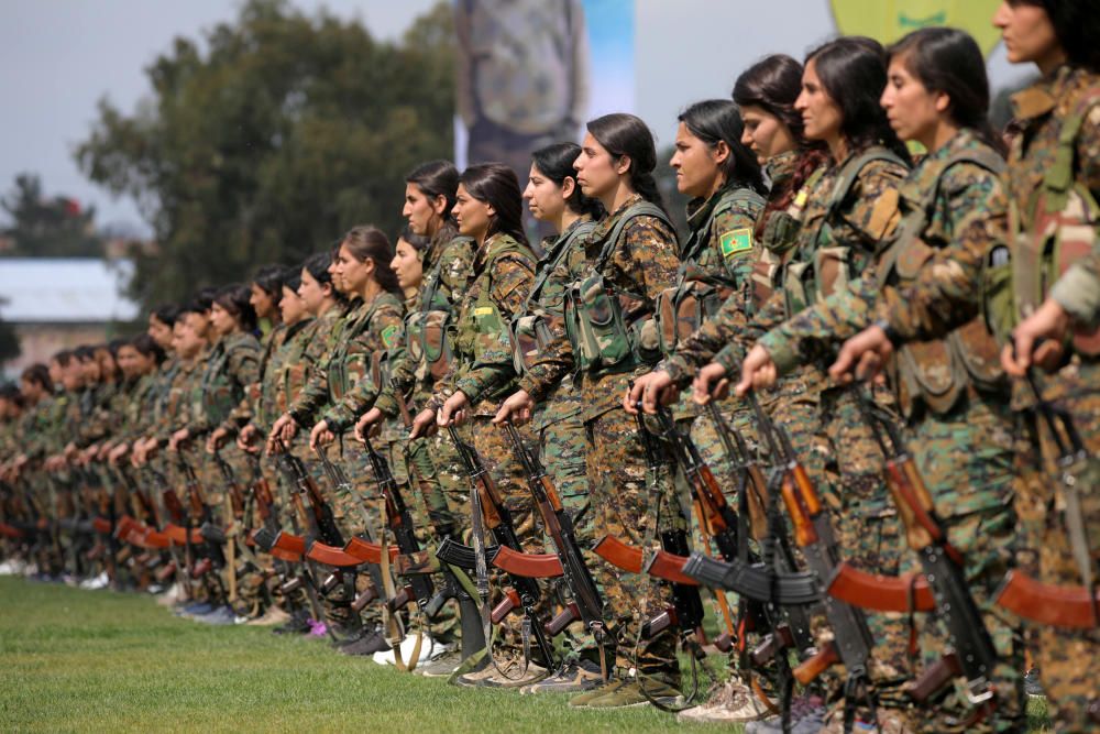 Kurdish female fighters of the Women's ...