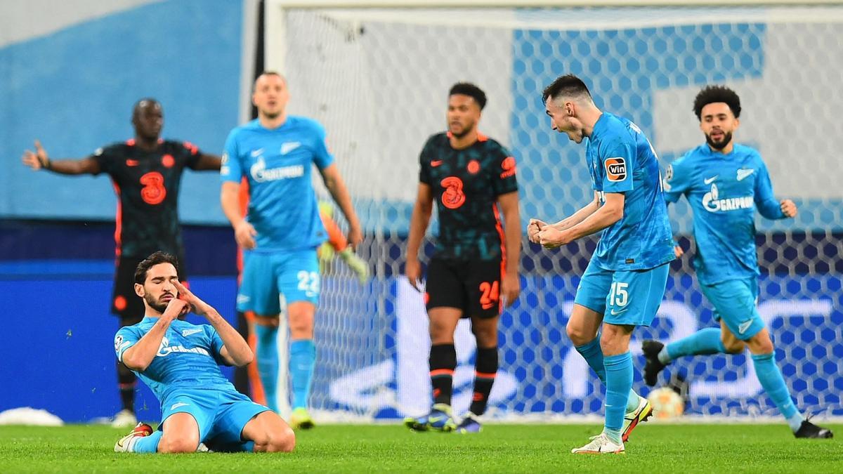 Zenit St. Petersburg's Russian midfielder Magomed Ozdoev celebrates after scoring their third goal during the UEFA Champions League group H football match between Zenit St. Petersburg and Chelsea at the Gazprom Arena stadium in Saint Petersburg on December 8, 2021. (Photo by Olga MALTSEVA / AFP)